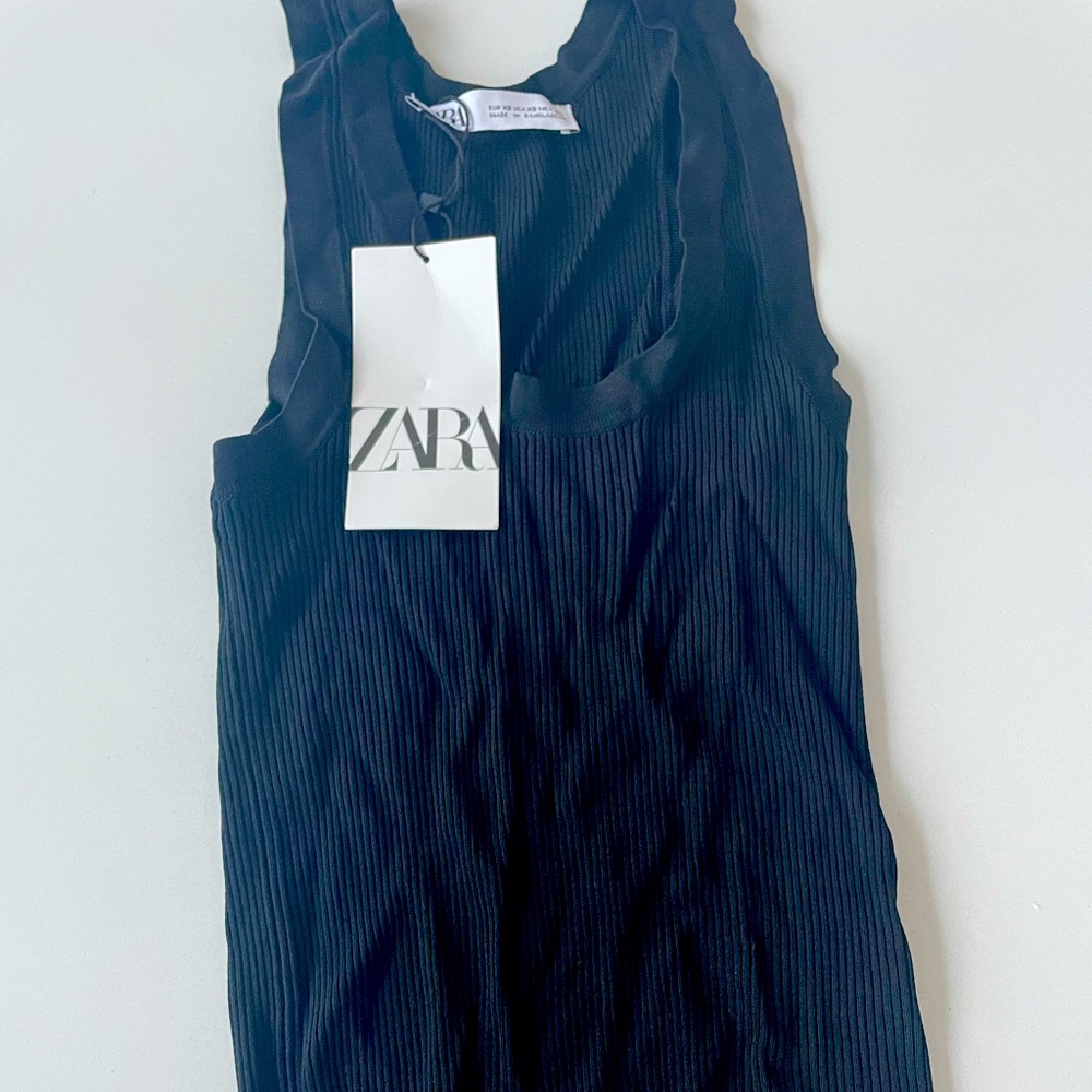 Black, ribbed, tank top from Zara. Size XS, fits like a small. New with tags.